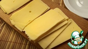 Пангасиус с сыром и овощами