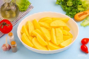 Минтай в духовке с картофелем